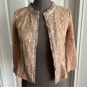 Quarter sleeve lace crewneck jacket with ribbon trim.
